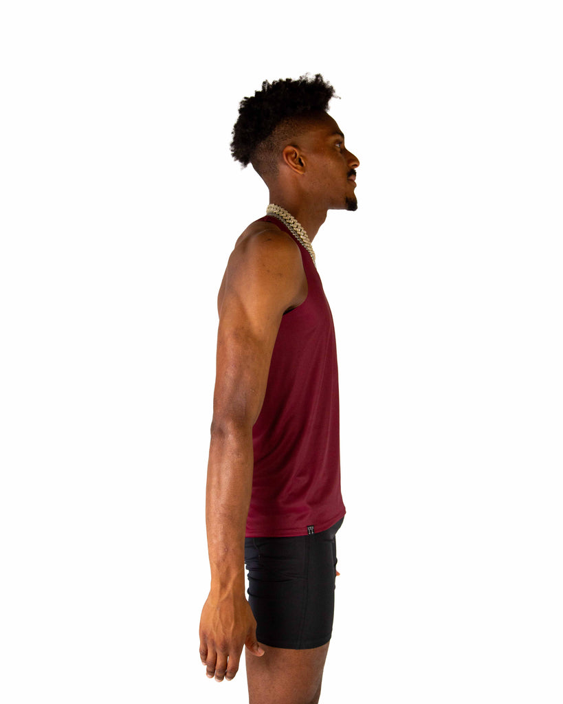Right side view of ChicknLegs Men's Performance Running Singlet featuring the breathable, quick-dry fabric and seamless arm opening for a smooth fit.