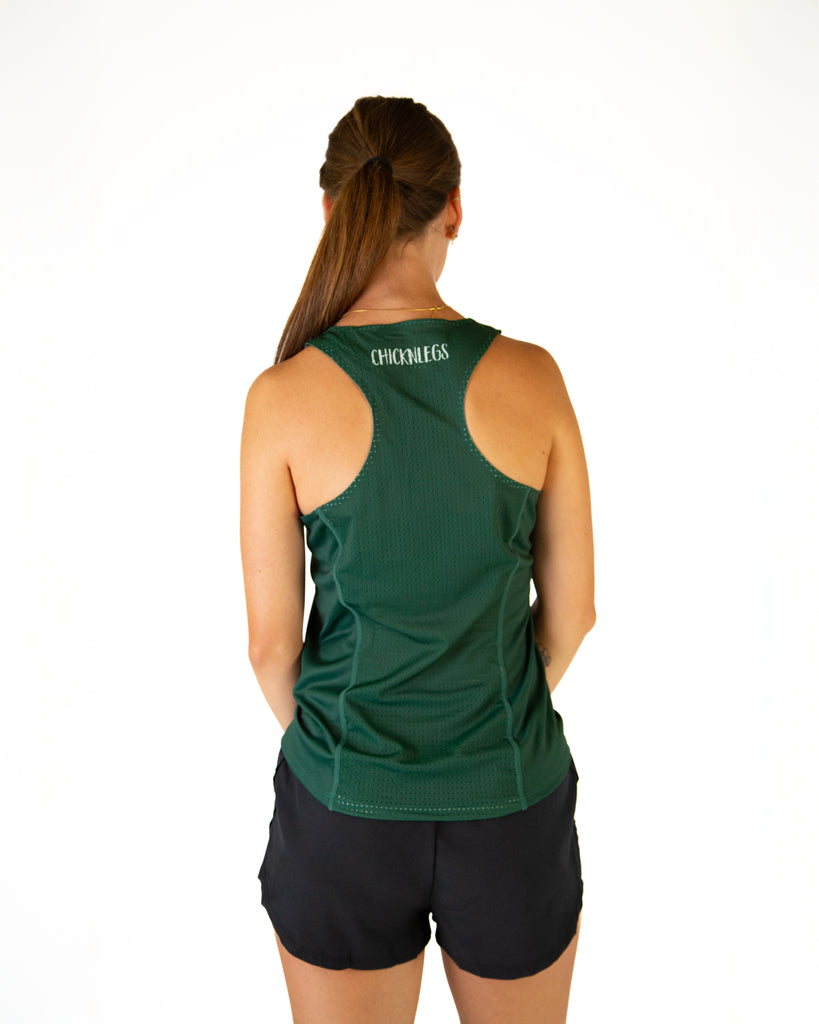 ChicknLegs women's performance running singlet in the forest green solid color is shown on the model. Breathable mesh back is shown on the image here.