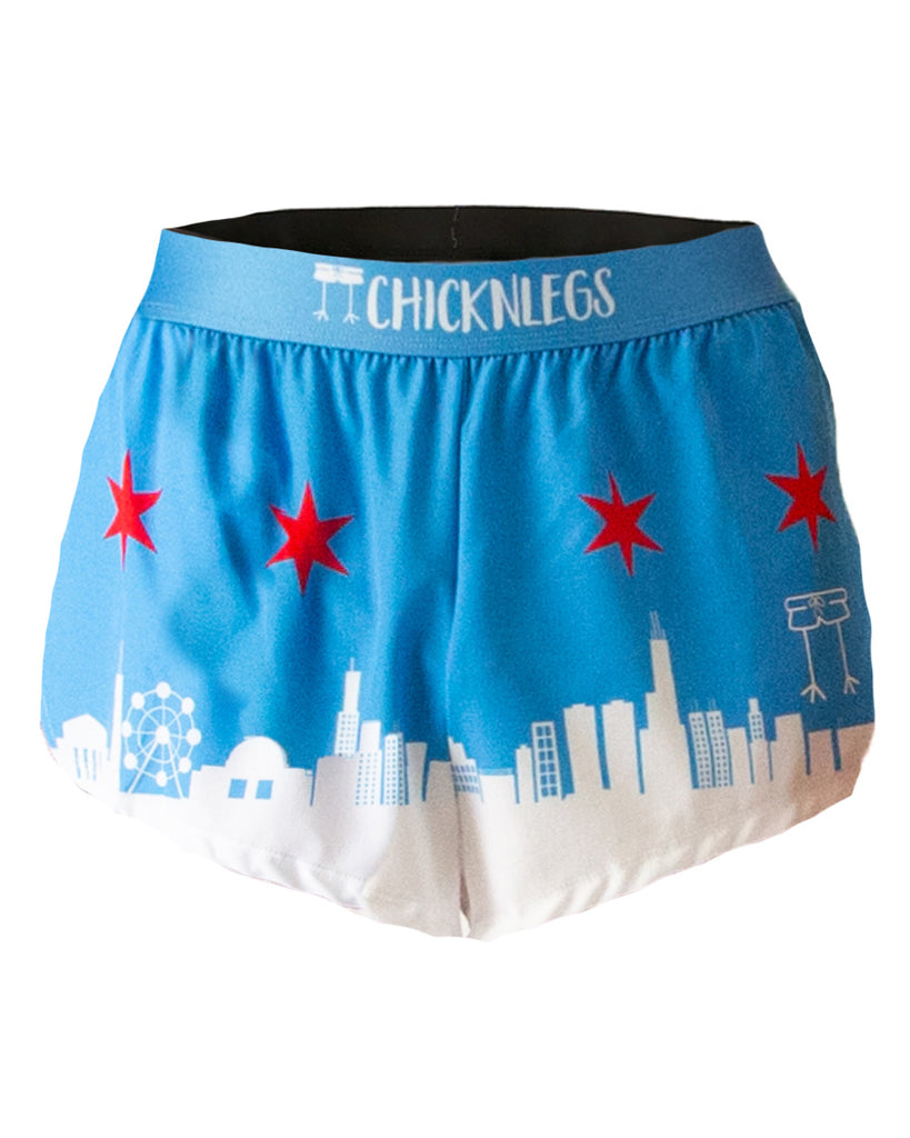 Ghost image for ChicknLegs men's 2 in split running shorts in the chicago style skyline print. It has blue, red and white on it.