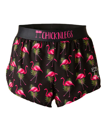 Chicknlegs men's 2 in split running shorts in the black flamingo design, made for runners that has pink flamingos on black background. 