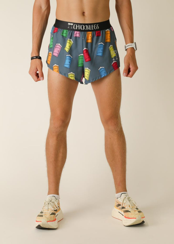 Model wearing Chicknlegs men's 2 inch split running shorts in the porta potty design, facing front.