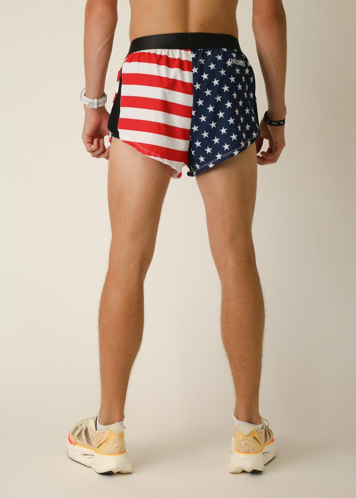 Model wearing Chicknlegs in men's 2 inch split running shorts in the usa design, facing back.