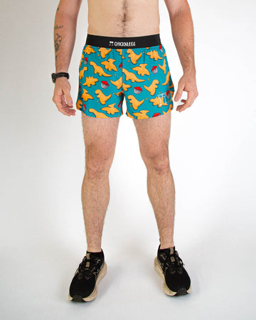 Front view of ChicknLegs men's 4-inch split running shorts with breathable liner, blue background and brown and orange dino nuggets with ketchup all over, with a black waistband and back pocket.