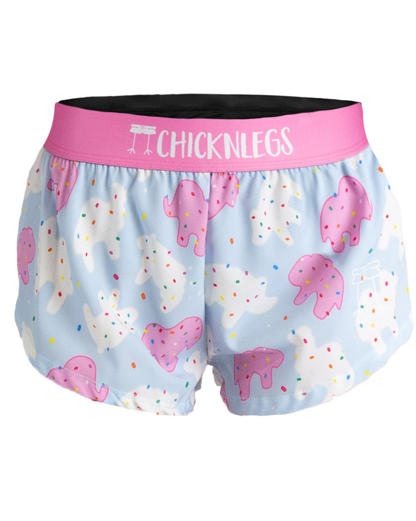ChicknLegs women's 1.5 in split running shorts in the Animal Cookies design. The print is fun, bright, pink, blue and a bunch of rainbow sprinkles all over it. A ghost image is shown here.