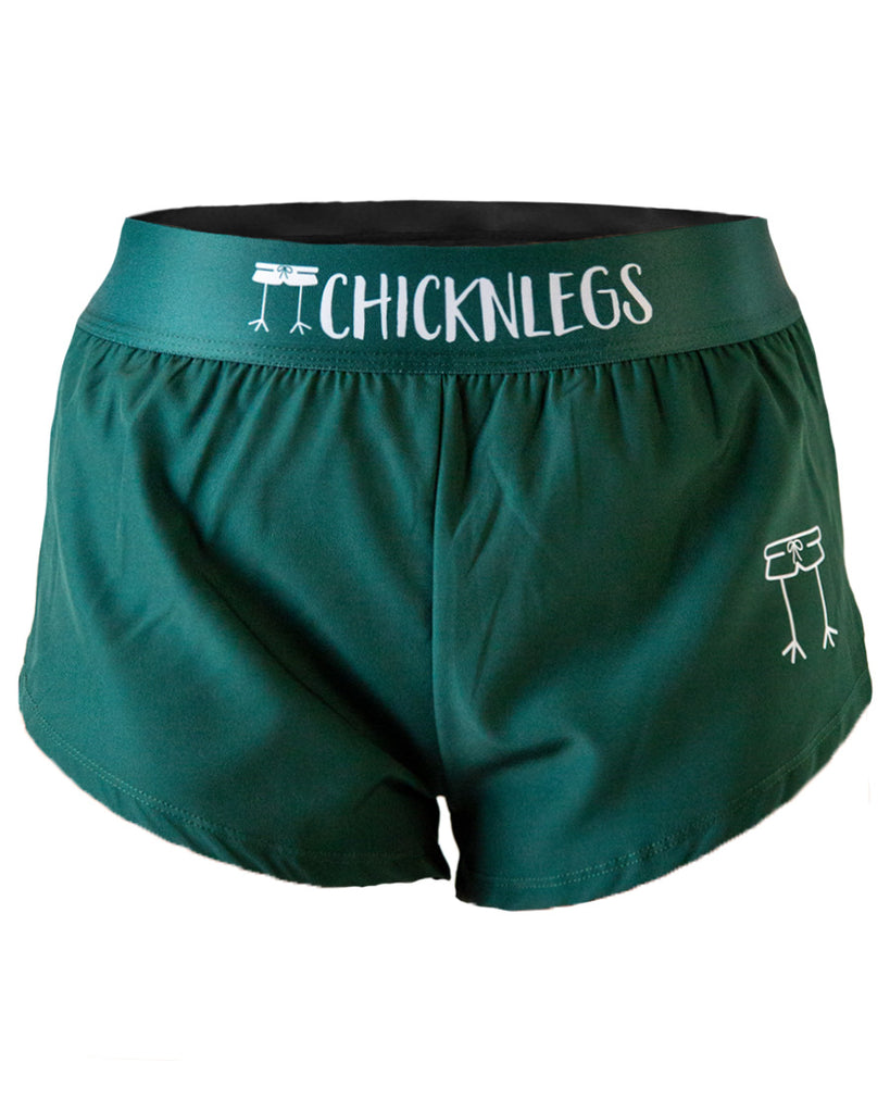 Close-up detail of ChicknLegs women’s 1.5-inch running shorts, solid forest green design and elastic matching forest green waistband.