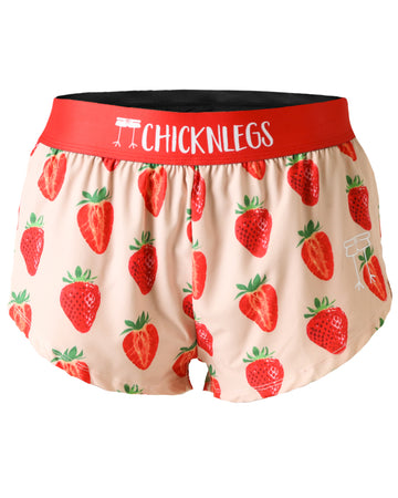 Chicknlegs women's 1.5 in split running shorts in the strawberry szn design, as a ghost image. The print has fun strawberries all over it.
