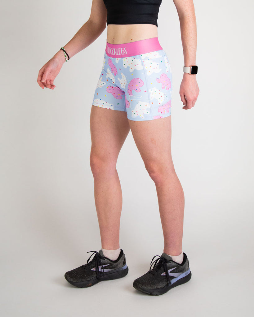 Runner is wearing ChicknLegs in the women's 3 in compression and spandex in the animal cookies design. The print has pink, white and blue on it with fun rainbow sprinkles on it. These shorts have side pockets on it that are great for holding apple and andriod phones.