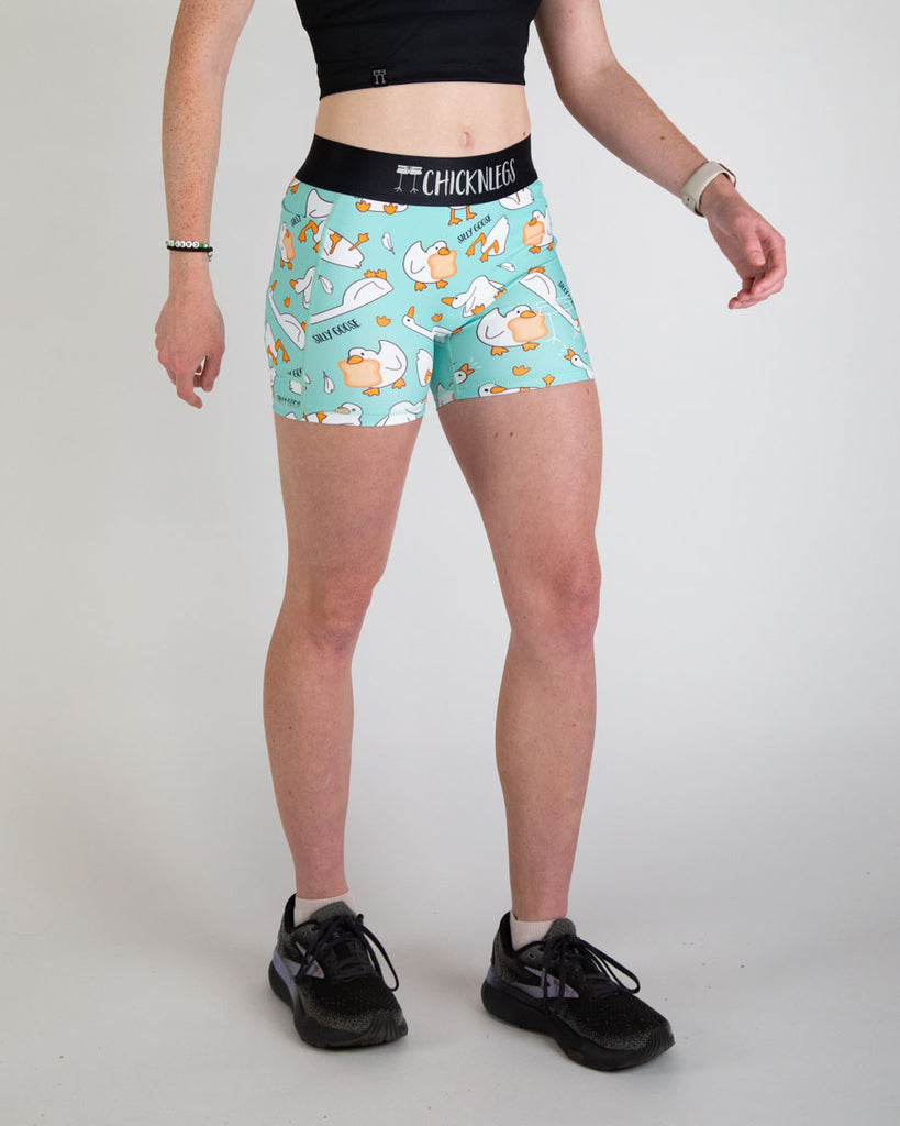 Runner is wearing ChicknLegs in the women's 3 in compression spandex shorts in the silly goose design. These shorts have pockets on the side that can hold keys, phones, and airpods!