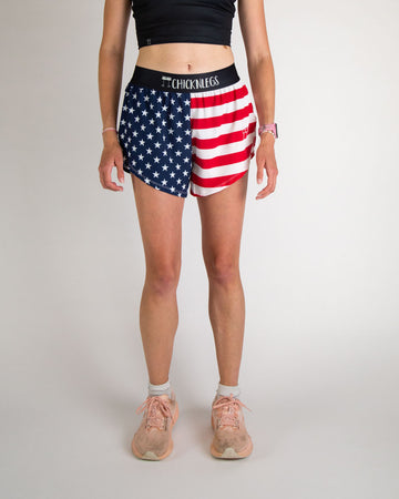 Runner is wearing ChicknLegs in the women's 4 in split running shorts in the USA State Flag design. Great for American pride and those who love to run. 