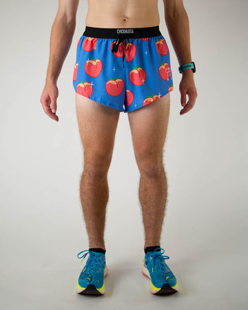 Front view of ChicknLegs men’s 2-inch split running shorts with drawstring, breathable liner, blue background and juicy peaches design.