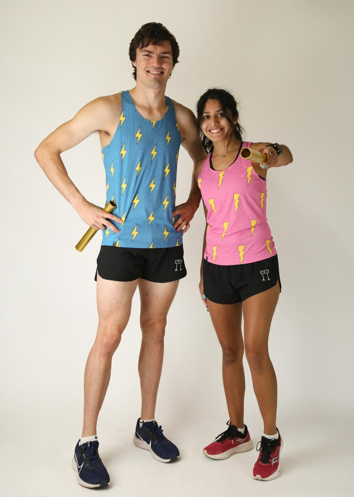 Models in a group photo wearing men's performance blue bolts singlet along with women's performance hot pink bolts design posing holding batons.