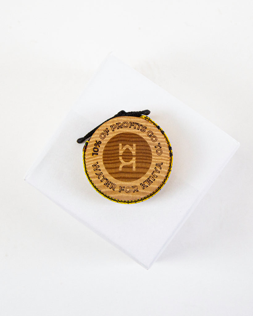 ChicknLegs artiken bracelet made with yellow and black beads. Great accessory for running and wearing with everyday clothes.