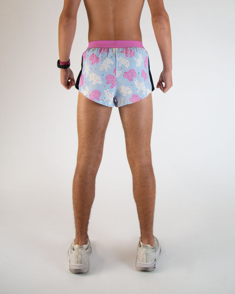 Runner is wearing ChicknLegs in the men's 2 in drawstrings split running shorts in the Animal Cookies design. The back is shown of the shorts in this image.