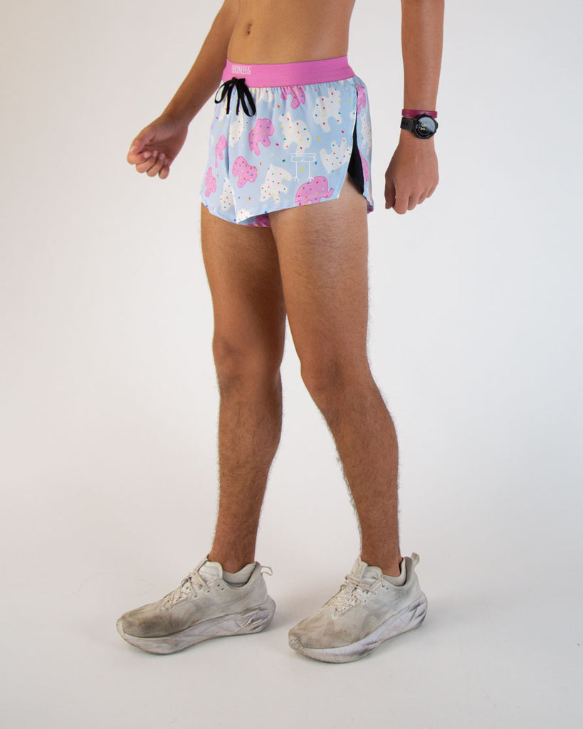 Runner is wearing ChicknLegs in the men's 2 in drawstrings split running shorts in the Animal Cookies design. Great for track and field, hiking, cycling, weight lifting, working out, and more!
