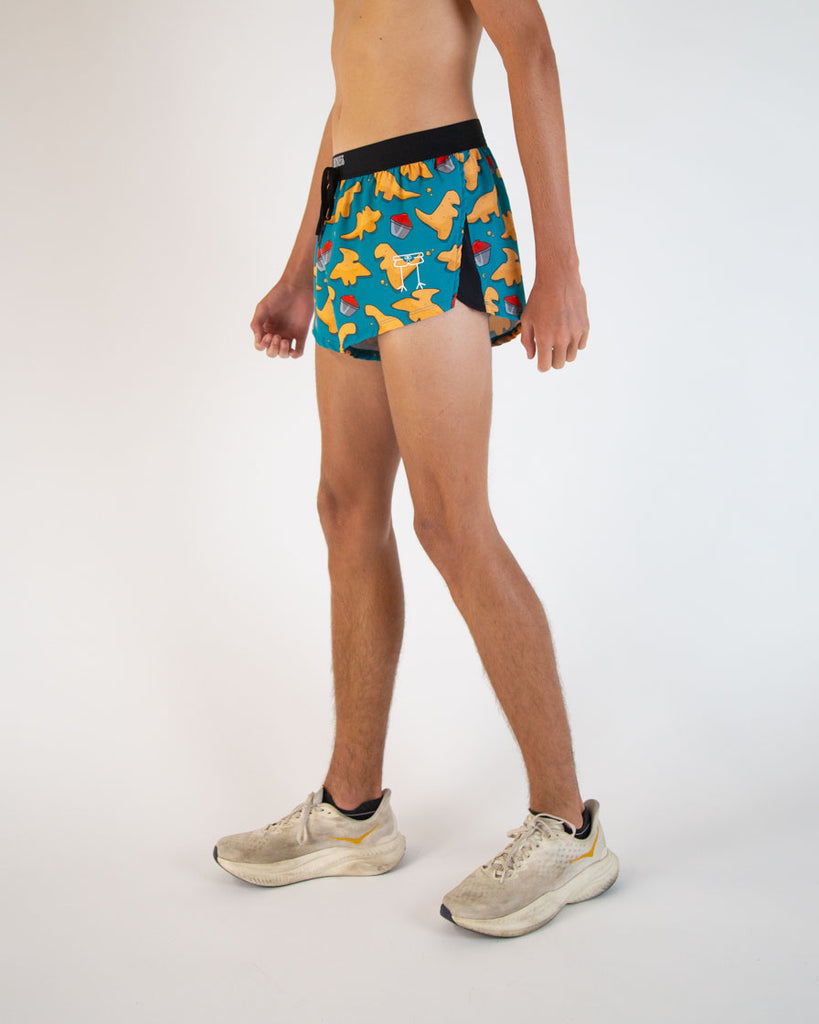 Runner is wearing ChicknLegs in the men's 2 in drawstrings in the split running shorts. The design has dinosaur  chicken nuggets on them with ketchup sauces. Great for no chaffing and adjustable strings.