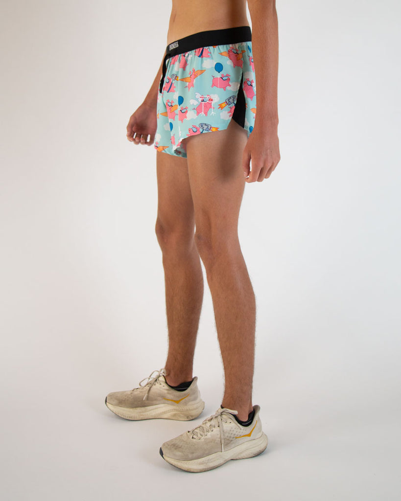 Runner is wearing ChicknLegs in the men's 2 in drawstrings in the split running shorts in the flying pig design. Great for no chaffing and adjustable strings to help tighten.