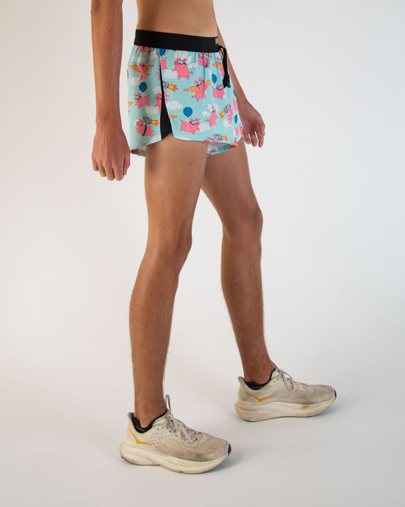 Runner is wearing ChicknLegs in the men's 2 in drawstrings in the split running shorts in the flying pig design. Great for track and field, weight lifting, hiking, trail running, working out, lifting, and more!