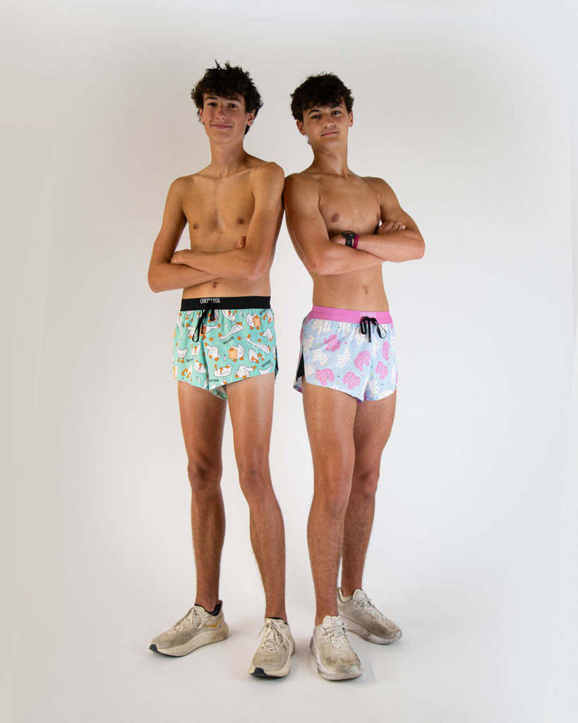 Runners are wearing ChicknLegs in the men's 2 in drawstring split running shorts in the Silly Goose and Animal Cookies design.