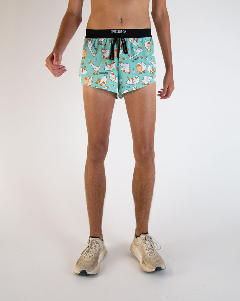 Runner is wearing ChicknLegs in the men's 2 in drawstring split running shorts in the Silly Goose design. The goose is loose! Featuring no chaffing, adjustable strings and a fun print.