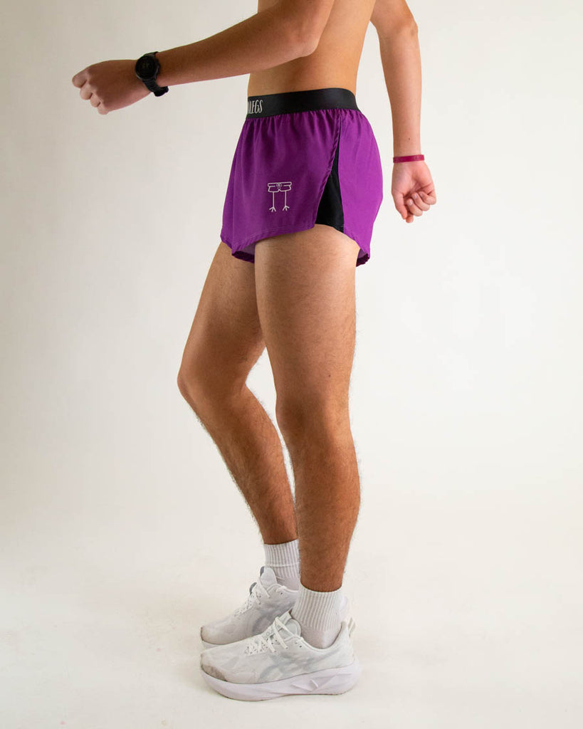 ChicknLegs men's 2 in split running shorts in the solid deep purple color to match with the choccy cow print. Left side is shown to show the side panel.