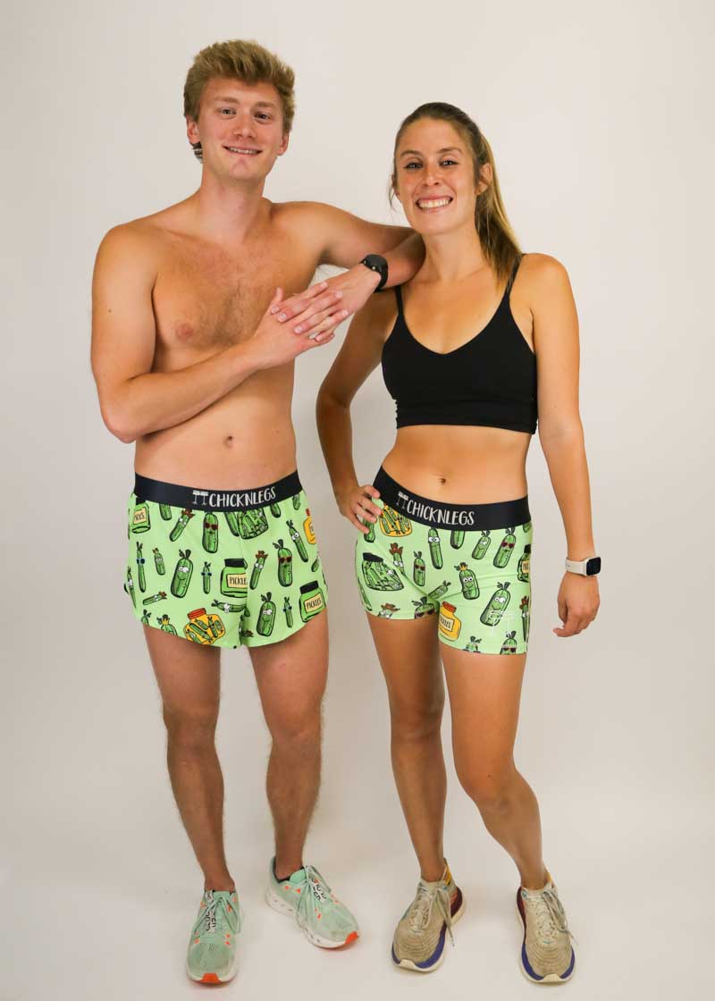 Runners taking a group photo wearing the ChicknLegs pickle running and compression shorts.