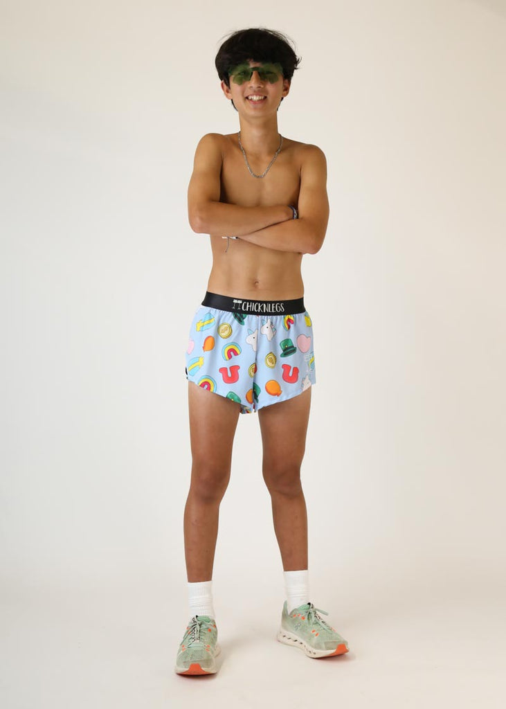 Model wearing mens 2 inch split running shorts in charms design front full body view wearing four leaf clover sunglasses