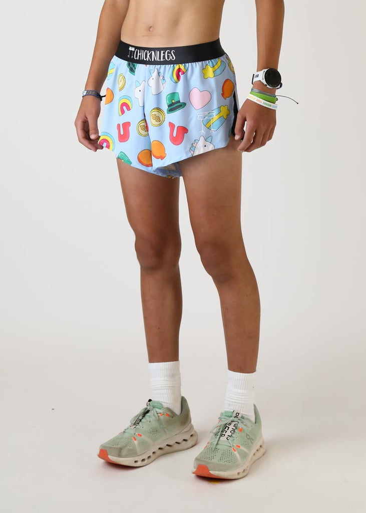 Model wearing mens 2 inch split running shorts in charms design left view