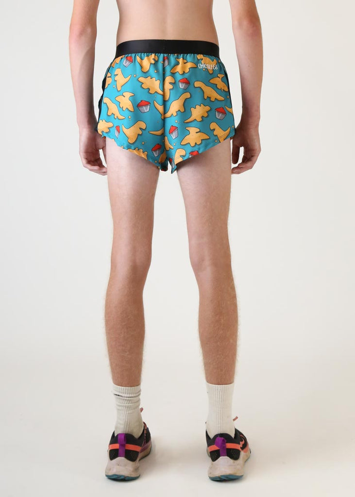 Model wearing Chicknlegs mens 2 inch split running shorts in dino nugget design back view