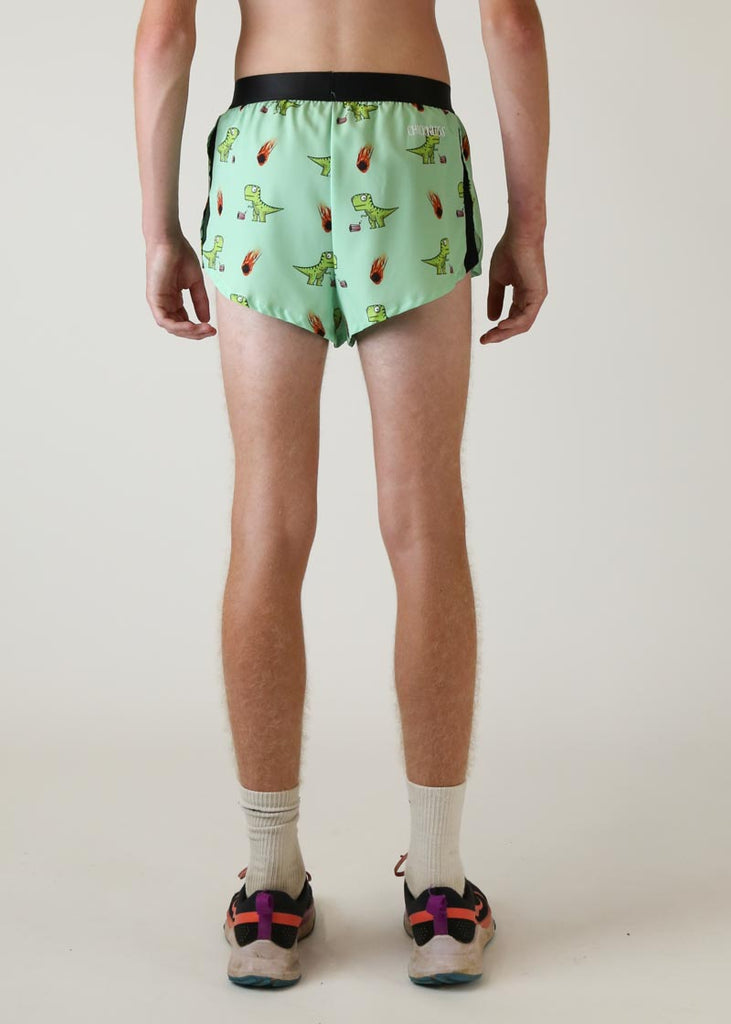 Model wearing chicknlegs mens 2 inch split running shorts with dinos design back view