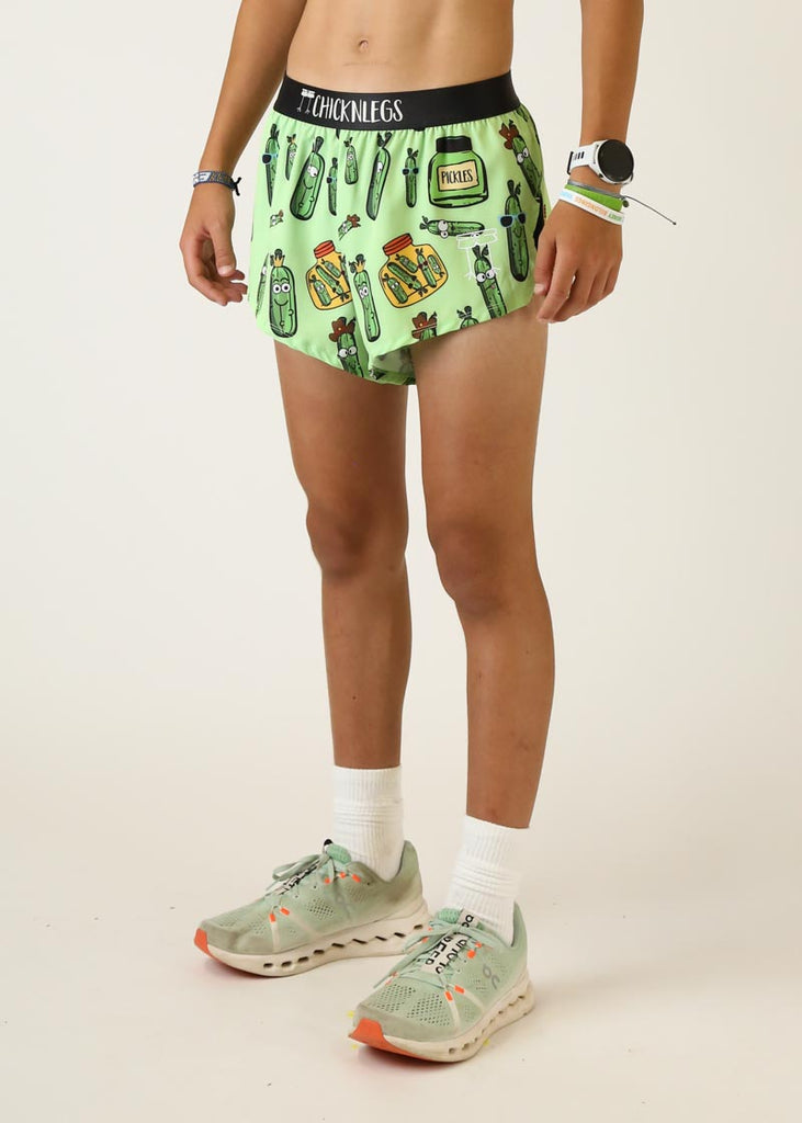 Model wearing Chicknlegs mens 2 inch split running shorts in pickles design left side view