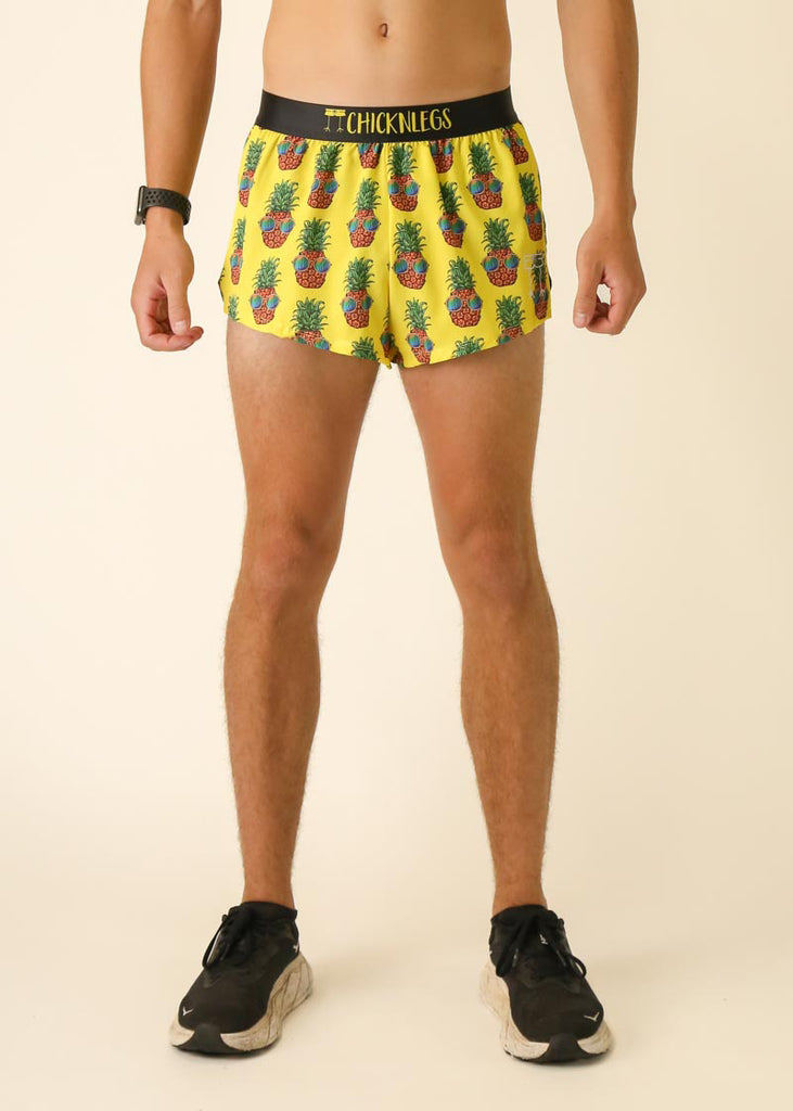 Runner is wearing ChicknLegs in the men's 2 in split running shorts with the pineapple express design.