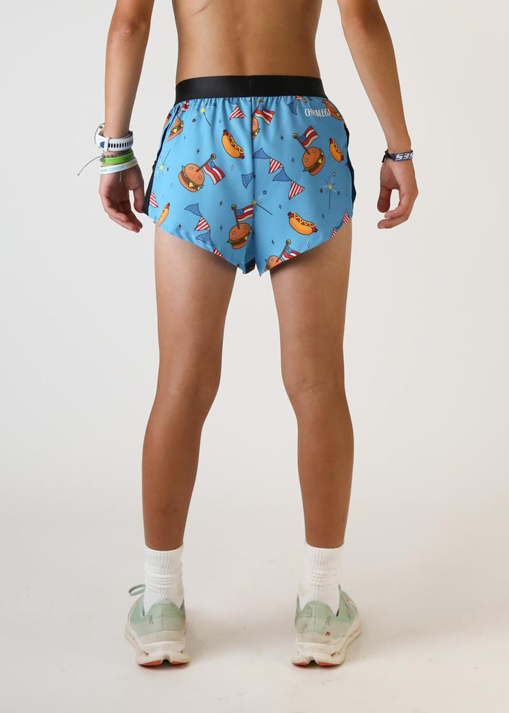 Model wearing Chicknlegs men's 2 inch split running shorts in USA cookout design back view