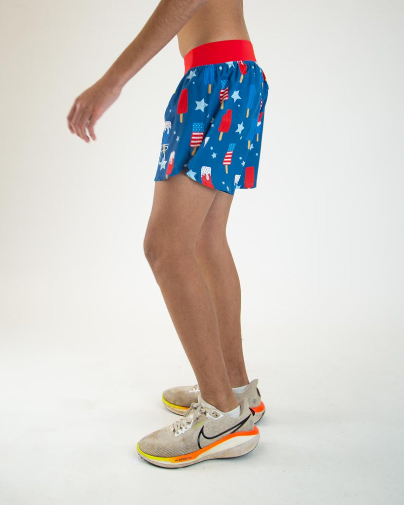 Runner is wearing ChicknLegs in the men's 4 in split running shorts with the USA popsicles that has blue, white and red with big stars for people who love america. 