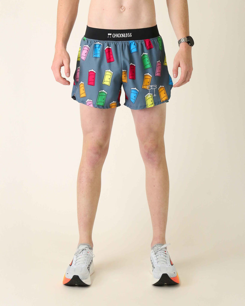 Runner is wearing ChicknLegs in the men's 4 in split running shorts with a back pocket and inner liner pocket. The print has porta pottys all over it in various colors such as red, yellow, orange, green, pink, and blue.