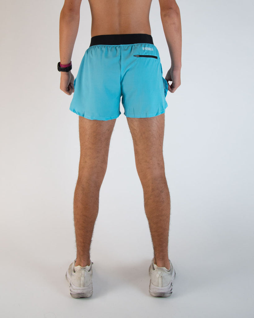 Runner is wearing ChicknLegs in the men's 4 in split running shorts in the sky blue design. The back of the shorts has a zipper on the right side. Good for storing phones, iphones, androids, gels, snacks, or keys!