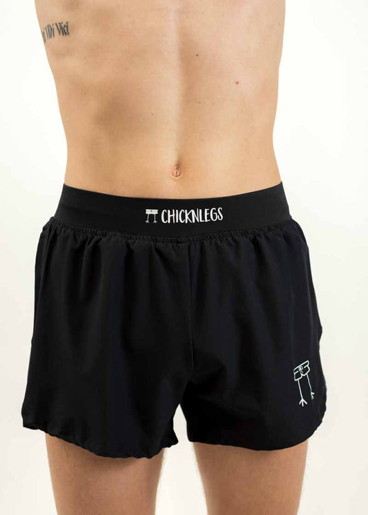 Close up front shot of the men's black 4 inch half split running shorts from ChicknLegs.