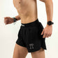 Left side shot of the men's 4 inch black running shorts from ChicknLegs.