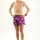 Full body shot of runner wearing the men's 4 inch chocolate milk cows running shorts from ChicknLegs.