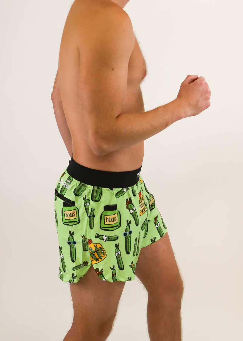 Side view showing the split of the men's 4 inch pickle running shorts.
