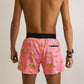 Back view of the men's pink bananas 4 inch split running shorts from ChicknLegs.