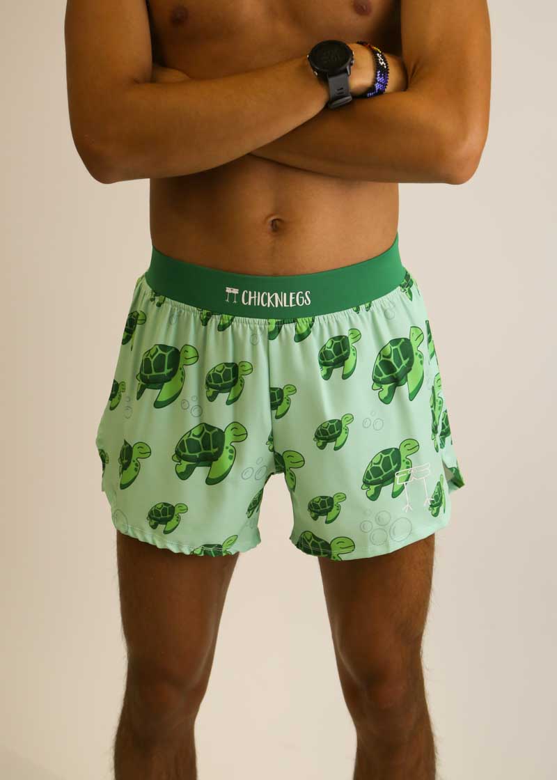 Front closeup view of the men's 4 inch sea turtle split running shorts from ChicknLegs.
