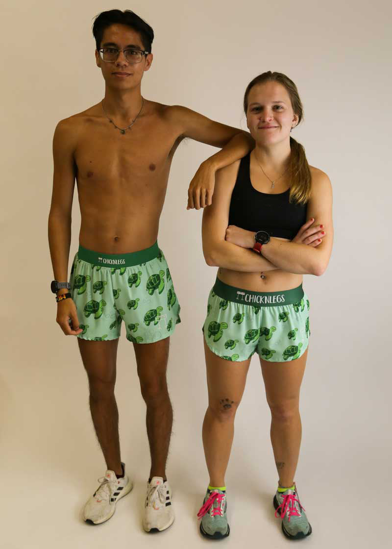 Group photo of the men's and women's sea turtle split running shorts.
