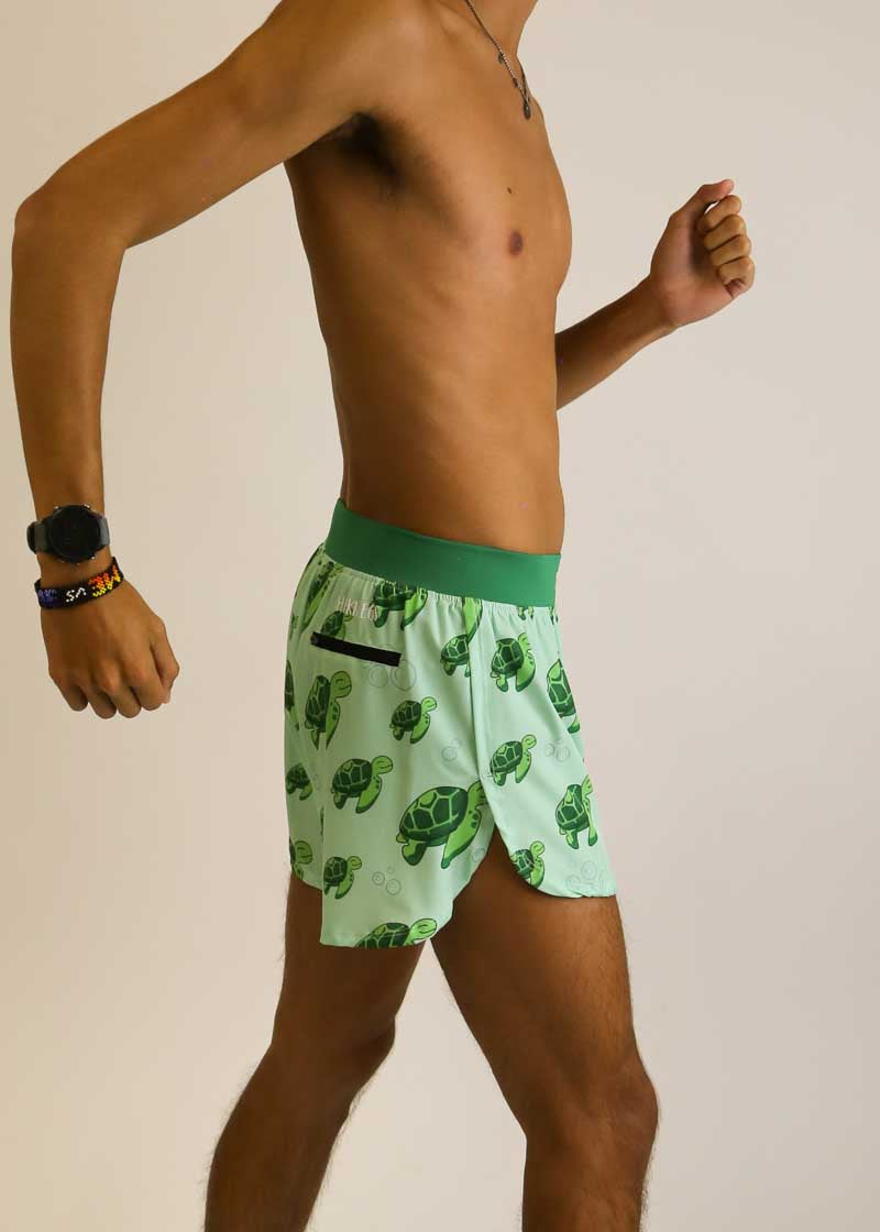 Right side view showing the split and zipper pocket of the men's 4 inch sea turtle running shorts from ChicknLegs.
