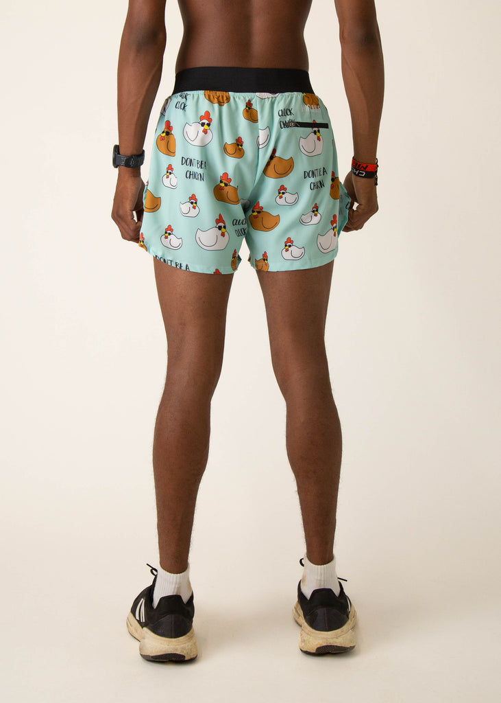 Model wearing Chicknlegs in mens 4 inch split running shorts in the swaggy chickns design, facing away from the camera to show the back view.

