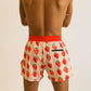 Back view of the men's 4 inch split running shorts with a strawberry design.