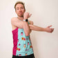 Runner stretching while wearing the men's PB&J performance singlet.