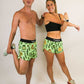 Group photo of two runners wearing the men's and women's pickle running shorts from ChicknLegs.