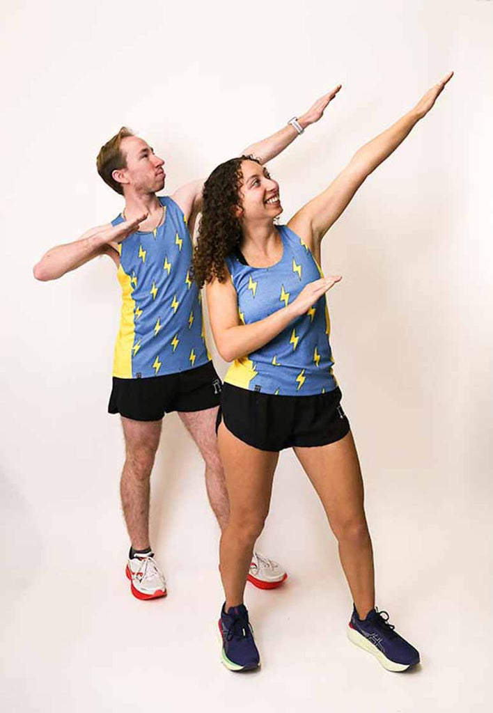 Runners doing the Usain Bolt pose while wearing the blue bolts running singlets from ChicknLegs.