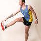 Runner stretching while wearing the ChicknLegs split shorts and blue bolts performance singlet.