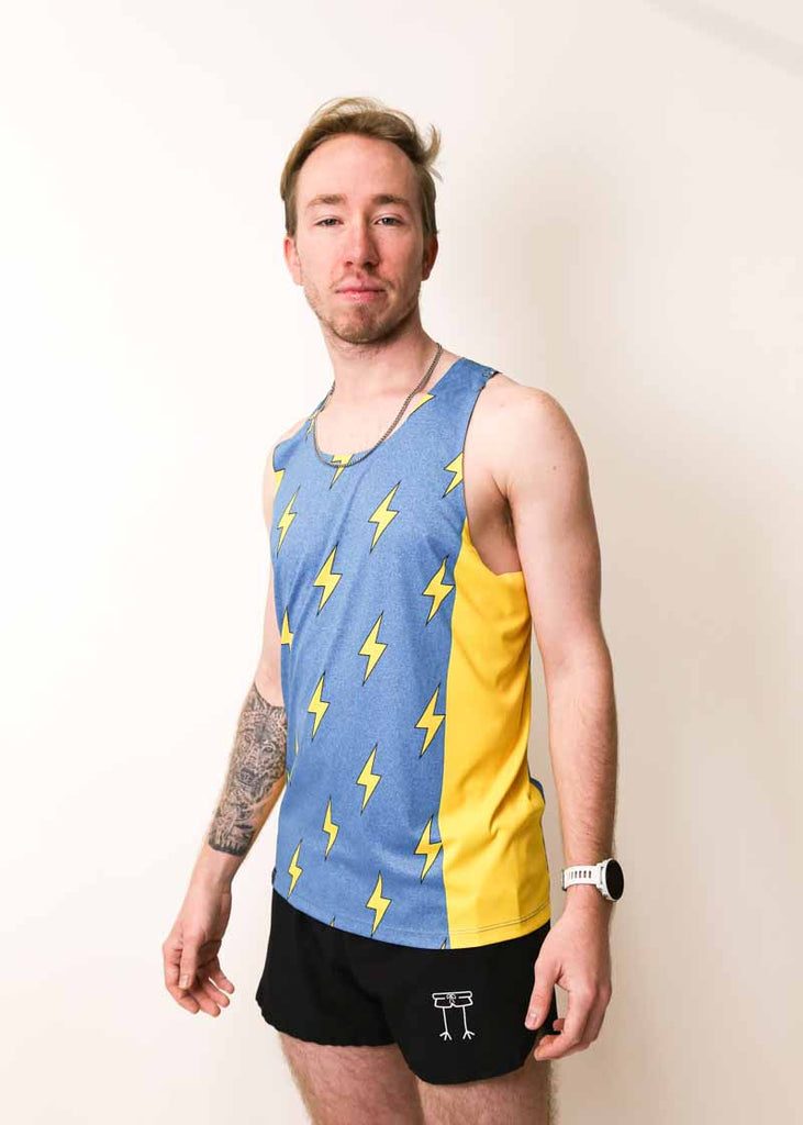 Side view of the men's blue bolts performance singlet from ChicknLegs.